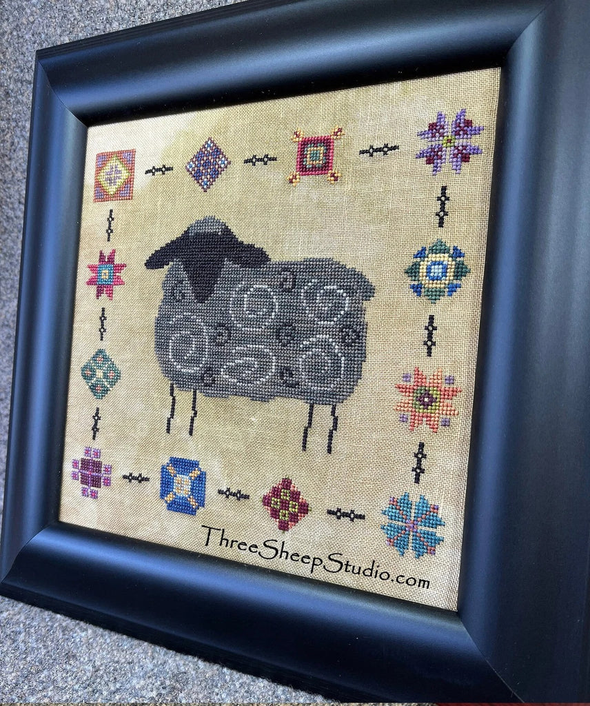 Wrapped in a Quilt The Black Sheep Cross Stitch Pattern by Rose Clay